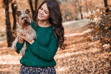 Woman walk with dog in the park