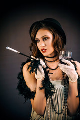 Roaring twenties poster flapper party girl, vintage 20s fashion style and make up and hairstyle,...