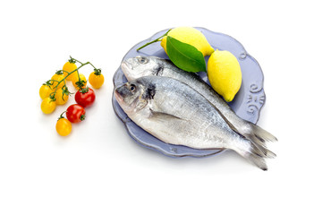 Fish sea breams(Sparus aurata) on a plate