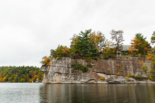 rocks with changing trees in the fall