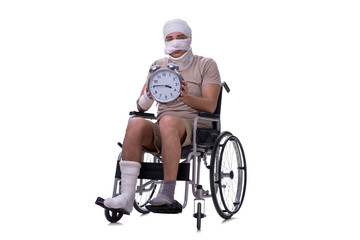 Obraz premium Injured man in wheel-chair isolated on white