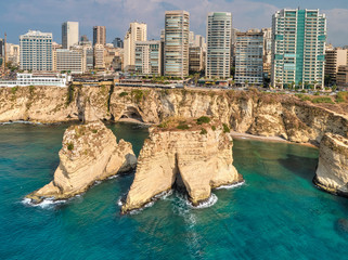 Fototapeta premium Rouche rocks in Beirut, Lebanon in the sea during daytime. Pigeon Rocks in Mediterranean sea.