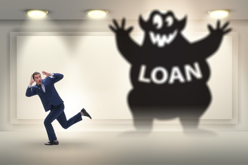 Businessman in debt and loan concept