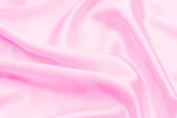 Obraz premium Plastic pink satin fabric texture soft blur background