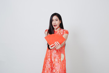 Asian woman dress traditional cheongsam on white