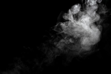Abstract powder or smoke effect isolated on black background