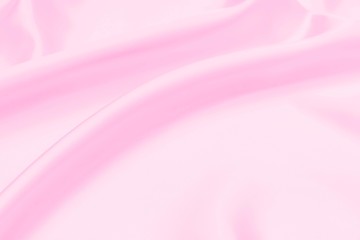 Plastic pink satin fabric texture soft blur background