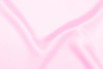Plastic pink satin fabric texture soft blur background