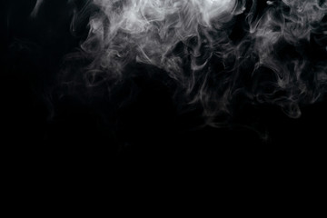 Abstract powder or smoke effect isolated on black background