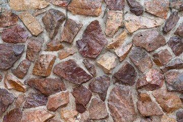 Brown stone wall construction background