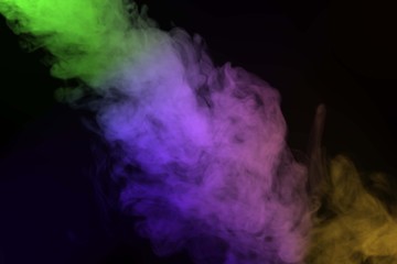 Abstract colorful smoke isolated on black background,Rainbow powder,Out of focus