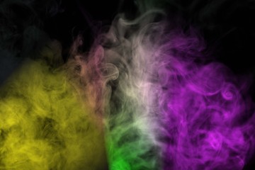 Obraz premium Abstract colorful smoke isolated on black background,Rainbow powder