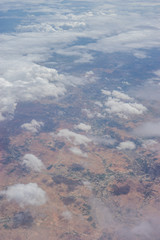 Bangalore to Pune, , a plane flying over clouds