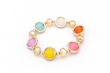 Colorful beads bracelet on white isolated background.