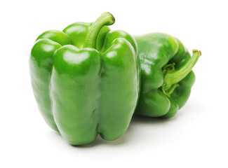 fresh green bell pepper (capsicum) on a white background