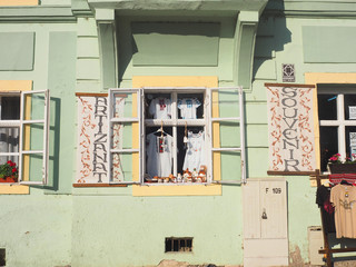 Colorful retro buildings in city center of Sighisoara, Romania