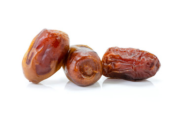 Closeup date palm fruits isolated on white background. Clipping path.
