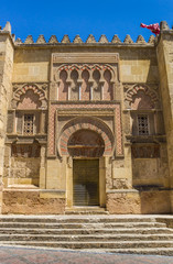 Decorated door and wall of the mosque cathedral in Cordoba