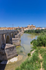 Fototapeta na wymiar Roman bridge over river Guadalquivir in Cordoba, Spain