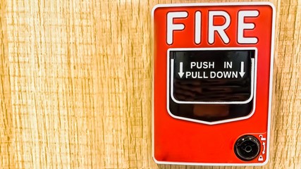 fire extinguisher sign on wall