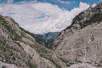 Panorama of mountains on route of Trift Bridge in national park Switzerland