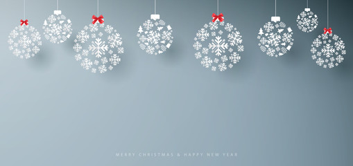 Merry Christmas and Happy New Year banner. Abstract white snowflakes on grey background. Paper art and craft design. Space for your design
