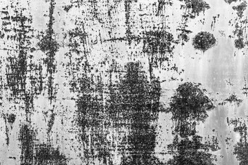 Metal texture with scratches and cracks which can be used as a background