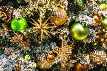 Obraz na płótnie Canvas Photo of beautiful New Year toys with green tree