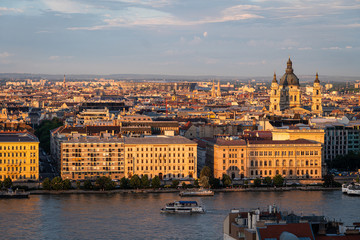 Sunset over the St. Stephen's Basilica and Budapest skyline by the Danube river in Hungary capital city