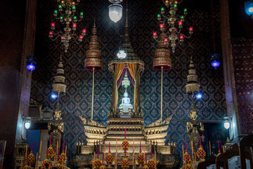 Fototapeta premium Within the church of Wat Theptidaram Temple, A beautiful bronze sculpture of Buddha situated in Wat Theptidaram main hall.