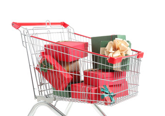 Shopping cart with gifts on white background