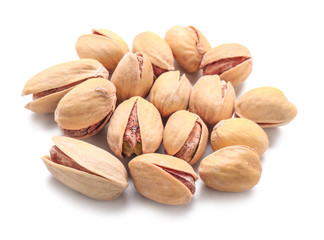 Tasty pistachio nuts isolated on white