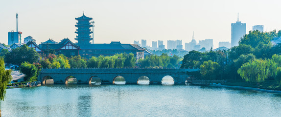 China's ancient city of the shandong qingzhou stone bridge landscape in the autumn