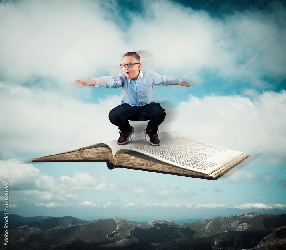 Wall mural flying with book