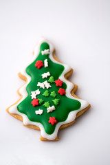 Christmas tree cookies with coloured sprinkles