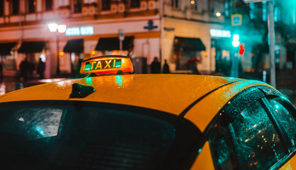 Wet night city street rain Bokeh reflection bright colorful lights puddles sidewalk Car