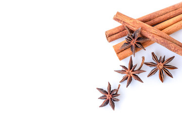 Close up Cinnamon sticks and star anise or aniseed isolated on white background. Natural herbal plant, spices seasoning conceptual.