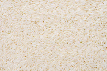 Long grains Thai white jasmine rice pattern texture background.
