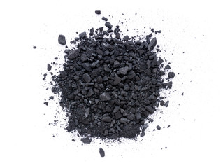 Pile of granular black activated charcoal  isolated on white background. Top view. Flat lay.