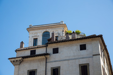 Fototapeta na wymiar Old buildings on the streest of Rome