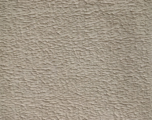 Texture of stucco used as an exterior coating on a building