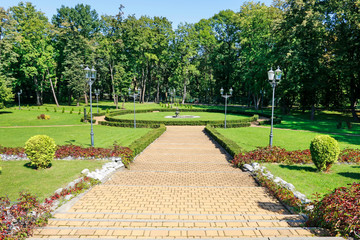 OKOCIM, POLAND - SEPTEMBER 11, 2019: Beautiful park by the palace
