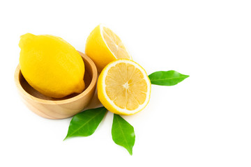 Fresh slice lemon with leaves, vitamin c supplement from natural  isolated on white background with copy space