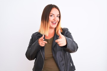 Young beautiful woman wearing t-shirt and jacket standing over isolated white background pointing fingers to camera with happy and funny face. Good energy and vibes.