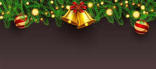 Website header or banner design decorated with golden jingle bell, pine leaves, baubles and lighting garland on brown background with space for your message.
