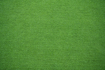 Green grass field background at gym for work out  fitness training