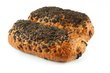 two chocolate buns on a white background