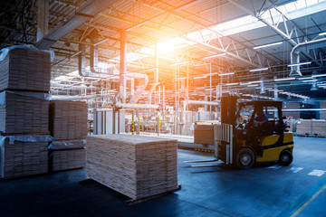 Forklift loader in storage warehouse ship yard. Distribution products. Delivery. Logistics....