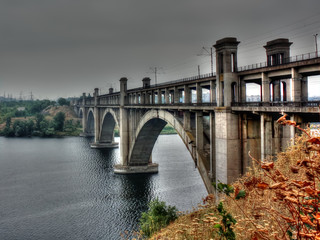 Fototapeta na wymiar Bridge in Zaporozhye across the river Dnieper. Bridge across river