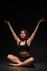 Fototapeta na wymiar Yoga girl in photo studio